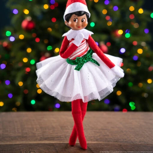 The Elf On The Shelf® Claus Couture® Candy Cane Classic Dress -Hot Sale Toy Store CCPEPDRESS Lifestyle XmasTree DkGirl 2048x2048 64932d02 af5a 49f9 affe 96ac9605509e